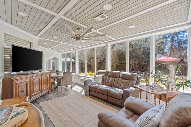 sunroom featuring wooden ceiling, visible vents, and ceiling fan