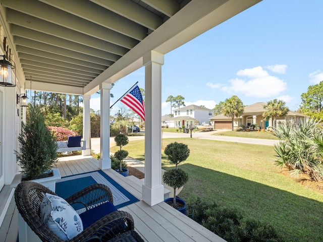 view of patio / terrace featuring a residential view and a porch