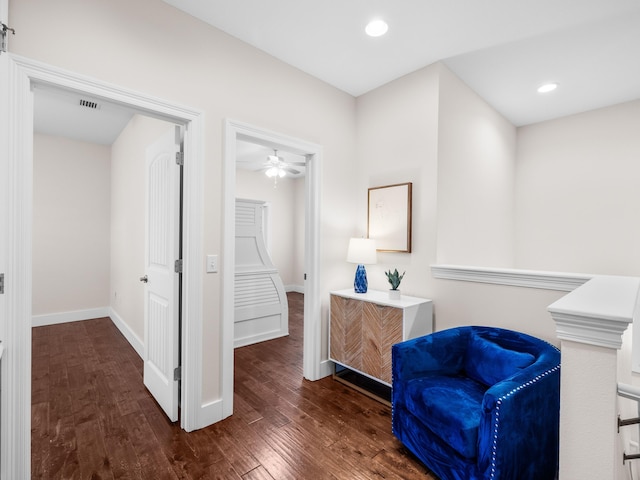 living area featuring recessed lighting, visible vents, baseboards, and hardwood / wood-style flooring