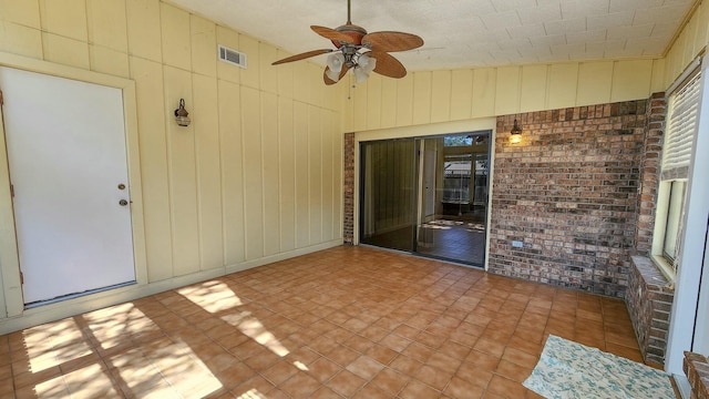 view of patio featuring visible vents and ceiling fan