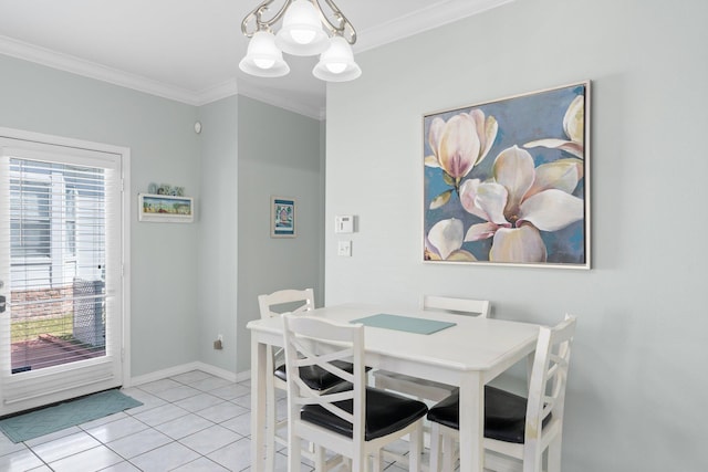 dining area featuring light tile patterned floors, baseboards, ornamental molding, and a notable chandelier