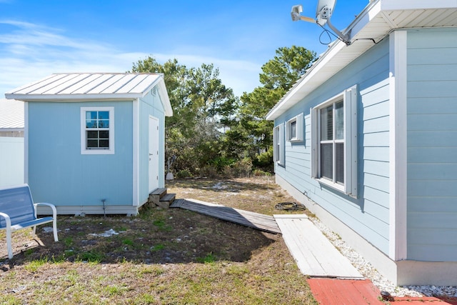 exterior space with an outbuilding and a storage unit