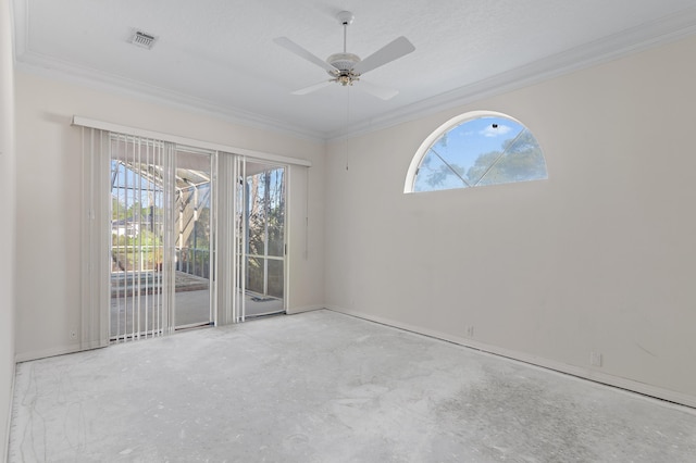 empty room featuring visible vents, ceiling fan, and ornamental molding