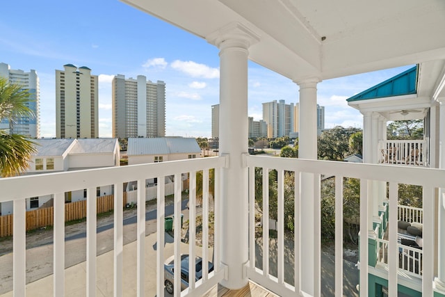 balcony featuring a city view