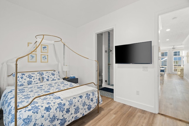 bedroom featuring recessed lighting, baseboards, and wood finished floors