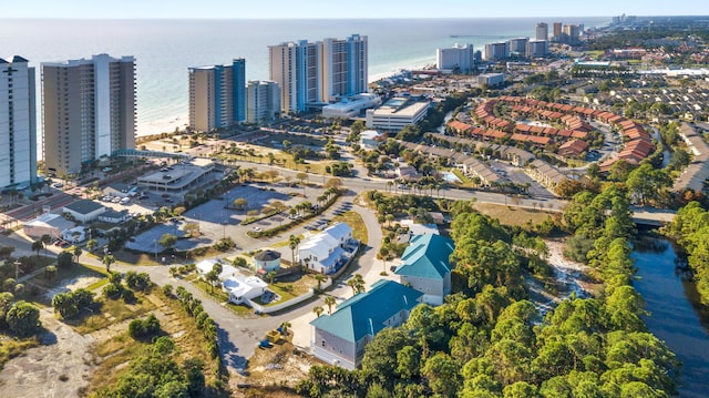 drone / aerial view with a city view and a water view