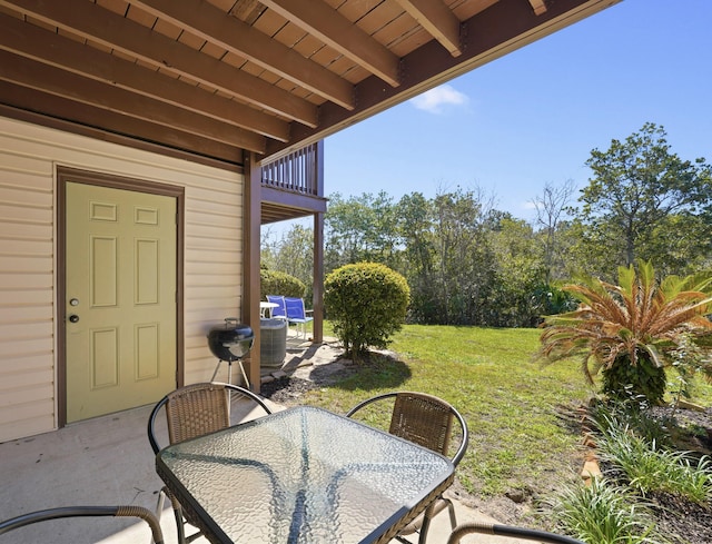 view of patio with outdoor dining area