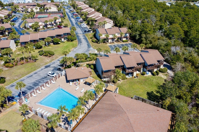 birds eye view of property with a residential view