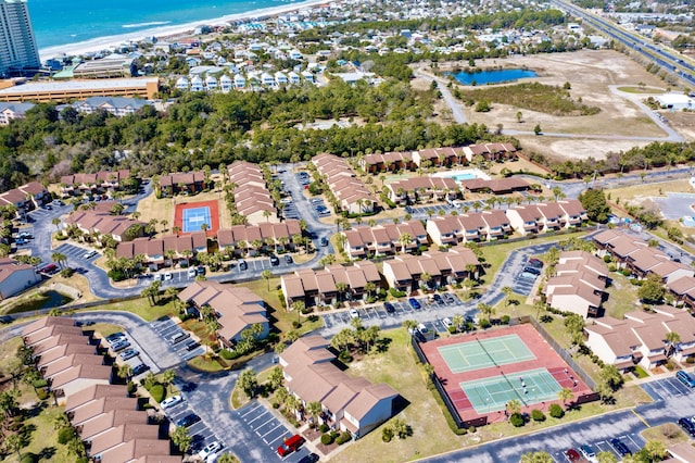 aerial view featuring a water view and a residential view