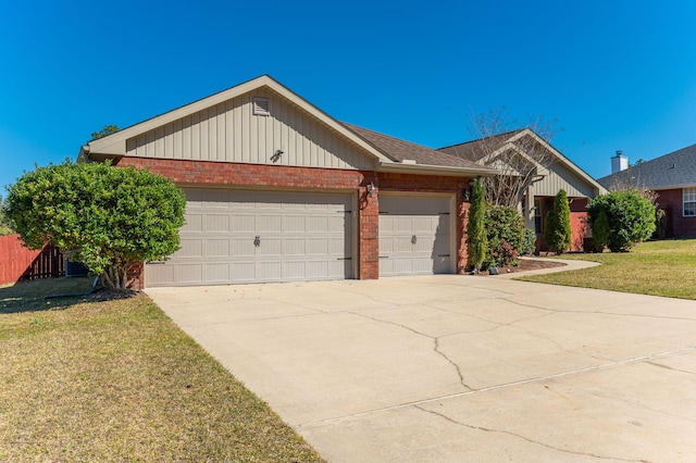 single story home with an attached garage, a front lawn, concrete driveway, and brick siding