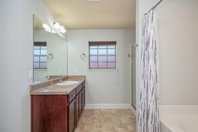 bathroom featuring curtained shower, vanity, a bath, and a healthy amount of sunlight