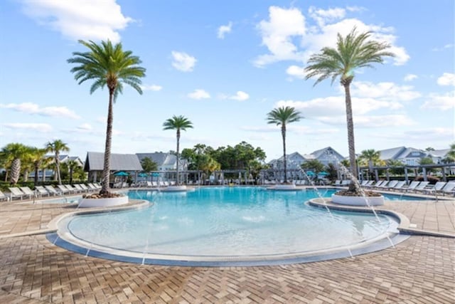 community pool with a patio