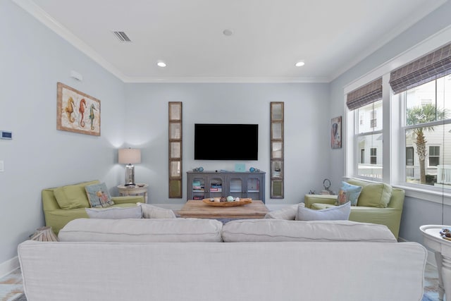 living area with visible vents, recessed lighting, baseboards, and ornamental molding