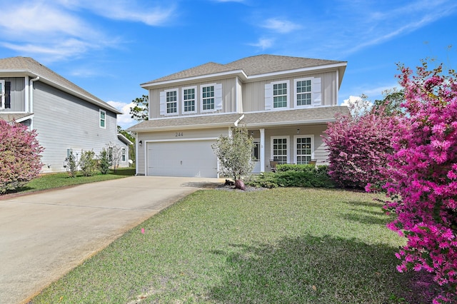 traditional-style home featuring an attached garage, driveway, roof with shingles, board and batten siding, and a front yard