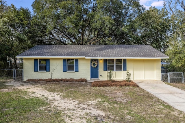 single story home featuring roof with shingles, a gate, fence, and brick siding