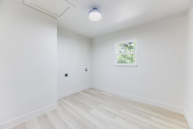 laundry area with laundry area, attic access, baseboards, hookup for a washing machine, and electric dryer hookup