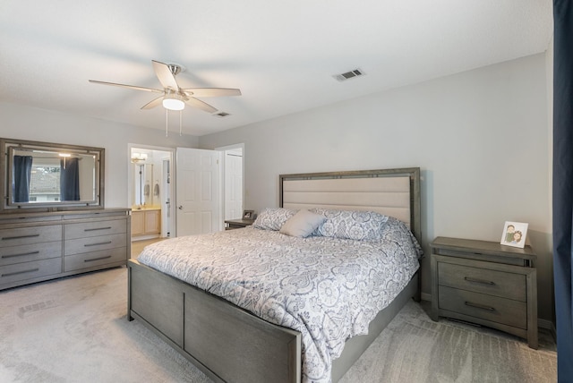 bedroom with visible vents, light carpet, and ceiling fan