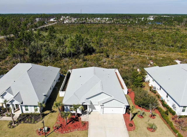 aerial view featuring a view of trees