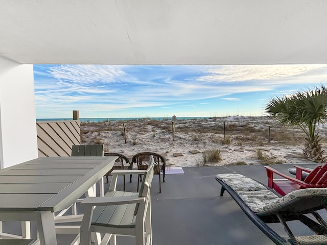 view of patio featuring outdoor dining area