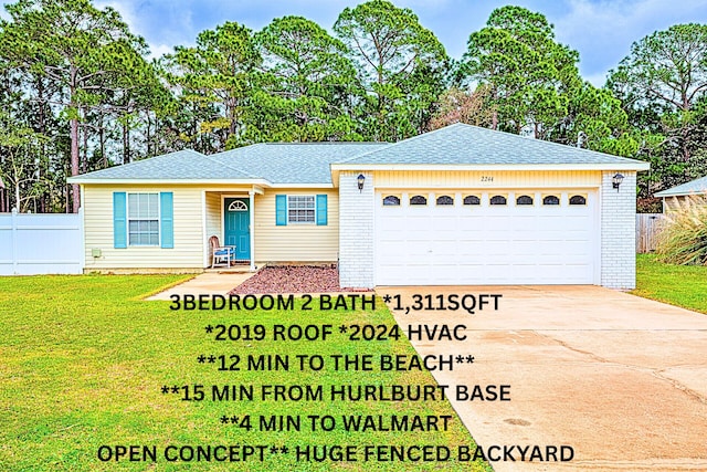 2244 Whispering Pines Blvd, Navarre, FL 32566 - view of front of property featuring an attached garage, driveway, and roof with shingles