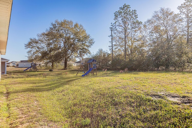 view of yard featuring a playground