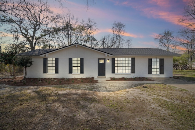 ranch-style home with brick siding