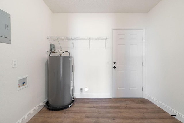 washroom featuring laundry area, wood finished floors, hookup for a washing machine, and electric water heater