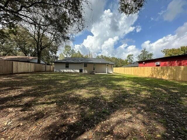 view of yard featuring a fenced backyard