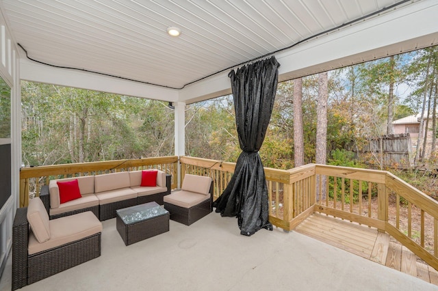 wooden deck with an outdoor hangout area