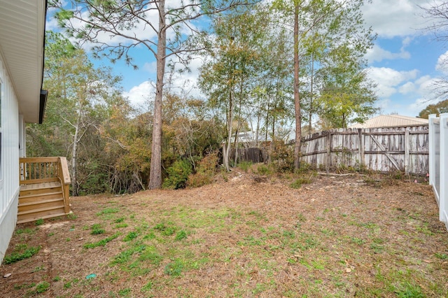 view of yard featuring fence