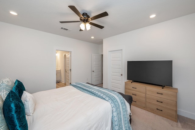 bedroom featuring a ceiling fan, recessed lighting, visible vents, and light carpet