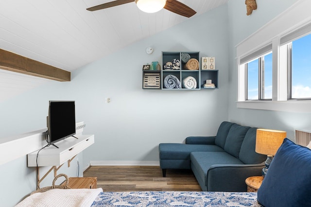 living area featuring lofted ceiling with beams, ceiling fan, wood finished floors, wooden ceiling, and baseboards