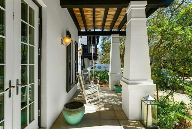 95 Rosemary Ave, Rosemary Beach, FL 32461 - balcony featuring french doors and covered porch