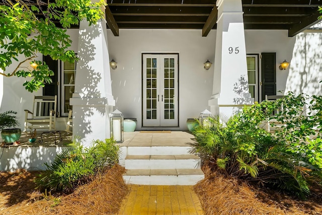 95 Rosemary Ave, Rosemary Beach, FL 32461 - property entrance with french doors and stucco siding