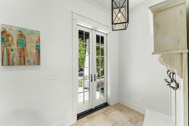 95 Rosemary Ave, Rosemary Beach, FL 32461 - entryway with crown molding, french doors, and baseboards