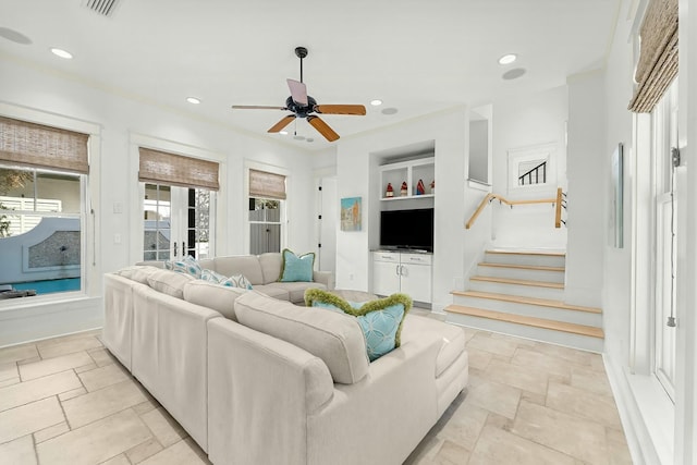 95 Rosemary Ave, Rosemary Beach, FL 32461 - living area featuring visible vents, built in shelves, stairs, recessed lighting, and stone tile flooring