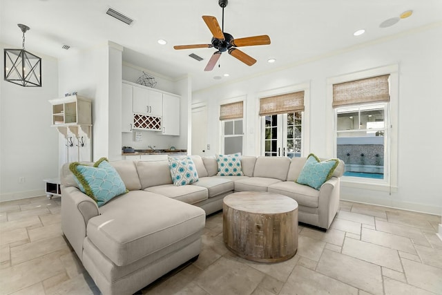 95 Rosemary Ave, Rosemary Beach, FL 32461 - living room featuring visible vents, recessed lighting, crown molding, and baseboards