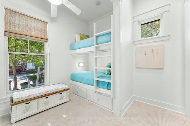 95 Rosemary Ave, Rosemary Beach, FL 32461 - bedroom featuring baseboards, multiple windows, and light carpet