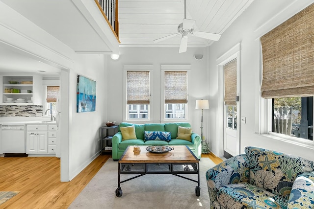 95 Rosemary Ave, Rosemary Beach, FL 32461 - sunroom / solarium featuring a wealth of natural light, wooden ceiling, a ceiling fan, and a sink