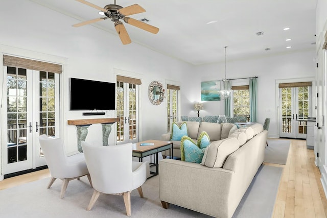 95 Rosemary Ave, Rosemary Beach, FL 32461 - living room featuring visible vents, ceiling fan with notable chandelier, recessed lighting, french doors, and light wood finished floors