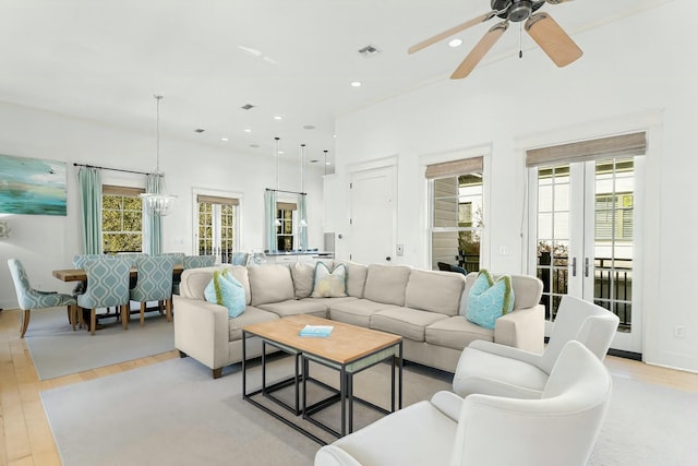 95 Rosemary Ave, Rosemary Beach, FL 32461 - living room with recessed lighting, light wood-type flooring, a healthy amount of sunlight, and visible vents