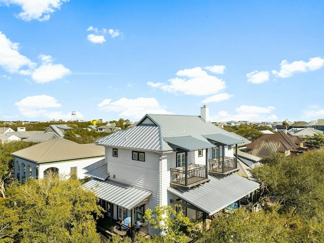 95 Rosemary Ave, Rosemary Beach, FL 32461 - rear view of property with metal roof