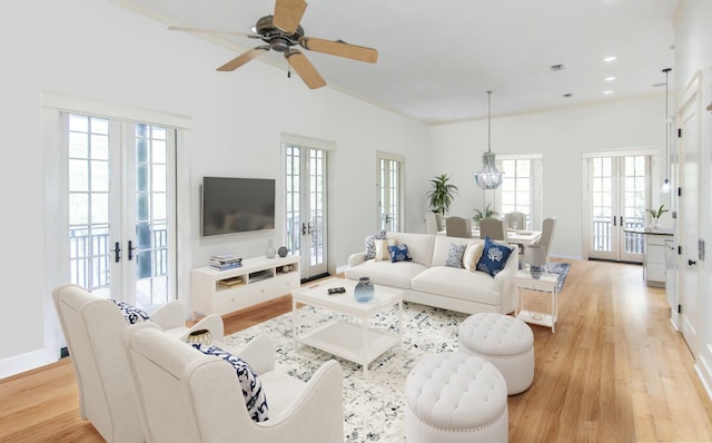 95 Rosemary Ave, Rosemary Beach, FL 32461 - living room featuring french doors, baseboards, and light wood finished floors