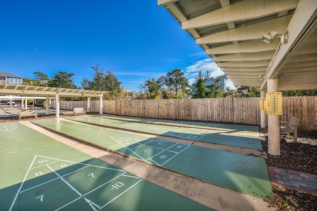 surrounding community featuring fence