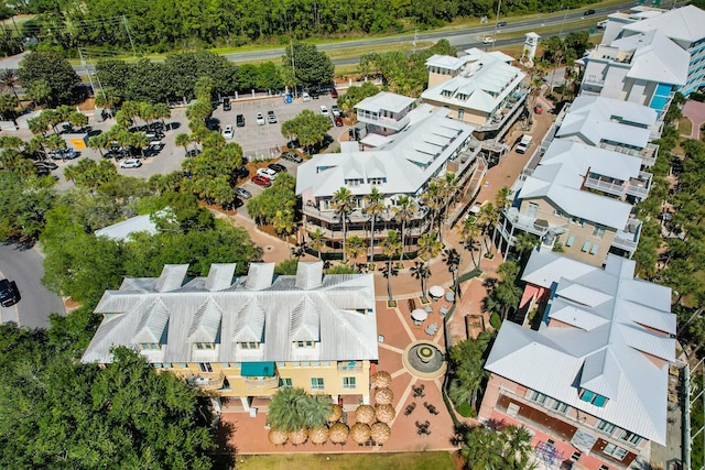 birds eye view of property with a residential view