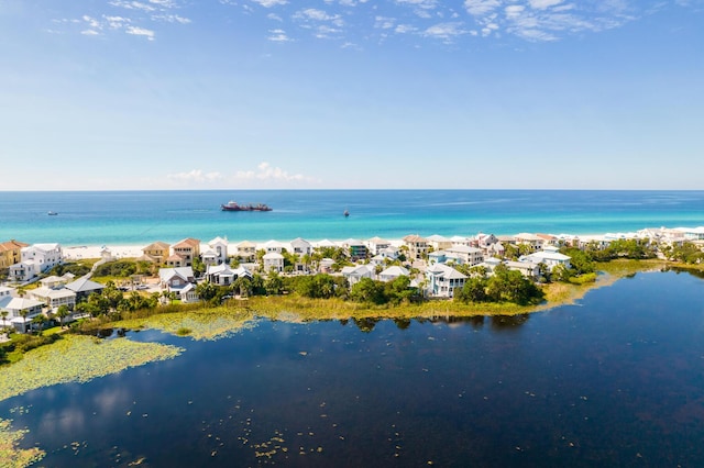 bird's eye view with a residential view and a water view