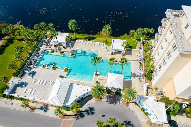 birds eye view of property featuring a water view