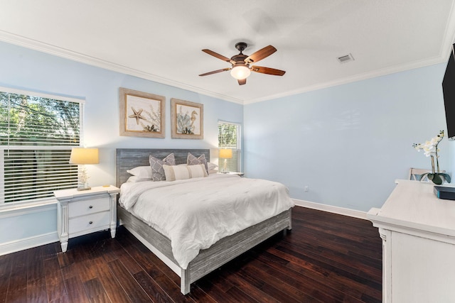 bedroom with baseboards, visible vents, dark wood-style flooring, and ornamental molding