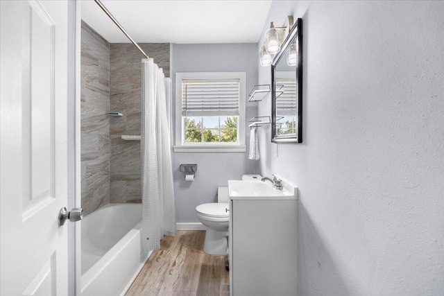 bathroom with shower / bath combo, toilet, vanity, and wood finished floors