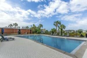 pool featuring fence